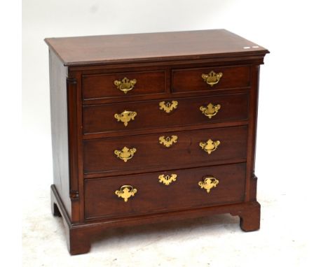 A George III and later mahogany and pine chest of small proportions with two short above three long drawers on bracket feet, 