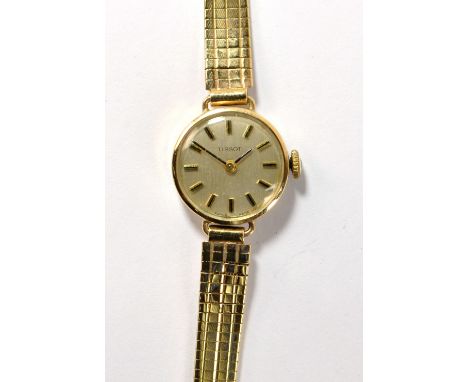 TISSOT; a lady's 9ct yellow gold cased mechanical cocktail watch, the circular dial set with baton numerals, diameter excludi