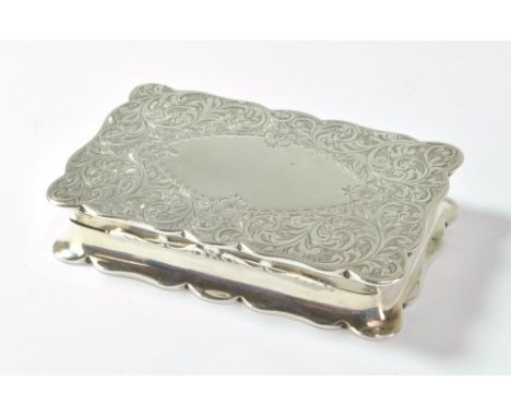 ROBERT CHANDLER; an Edward VII hallmarked silver shaped rectangular snuff box with waisted sides and overall engraved with fo