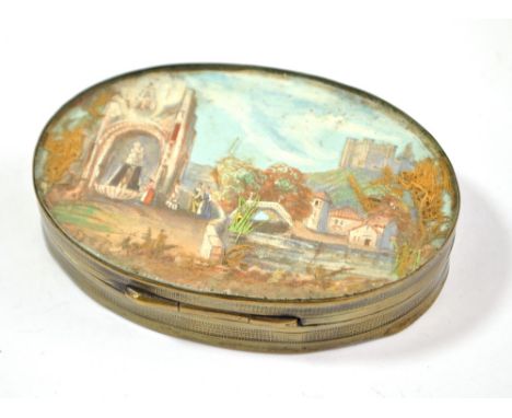 A George III brass oval snuff box finely decorated with watercolour on paper relief and moss detail with architectural and fi