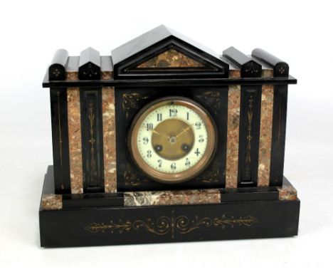 A late 19th century black slate and rouge marble mantel clock of architectural form, the porcelain chapter ring set with Arab