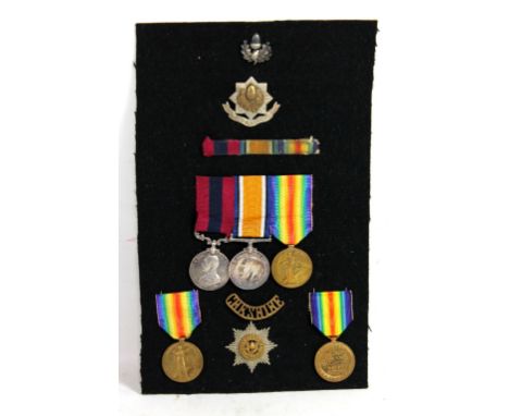 A WWI Distinguished Conduct Medal and War and Victory duo, the former impressed '291238 Pte. J. Dixon 1/7 Ches. R.-T.F.' and 
