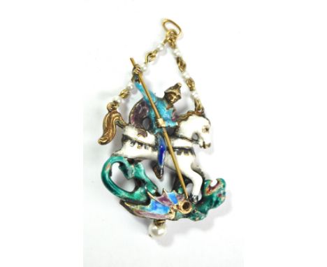 A gilt metal and enamel pendant modelled as St George and Dragon with open link and faux pearl suspension ring and faux pearl