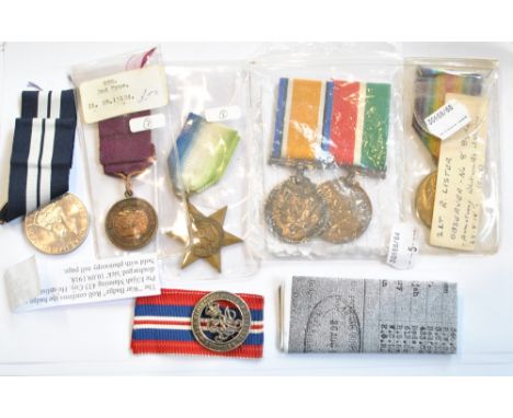 A mixed group of medals comprising WWI War and Mercantile Marine duo awarded to Edward Roberts, single WWI Victory Medal awar