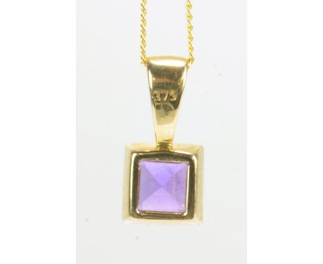 A 9ct yellow gold and amethyst pendant suspended on a fine link 9ct gold chain, approx 1g.