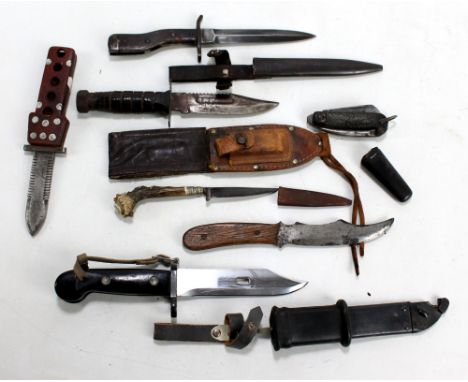 A mixed group of knives including example with serrated blade and white metal inlaid grip stamped AD/12/4118/1A, length total