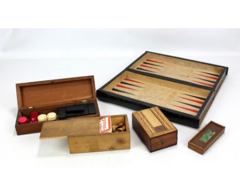 A 'Parlour Games' hinged box with chessboard to exterior and backgammon board to interior containing chess set, height of kin