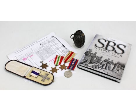 Four WWII medals comprising War Medal, 1939-1945, Africa and Italy Stars, unnamed as issued.  Also included is a reproduction