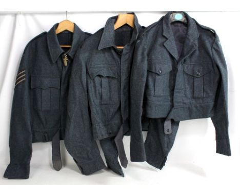 An RAF military issue Air Crew blouse with cloth badges and three chevrons to each shoulder, RAF cloth badge, gilt metal badg
