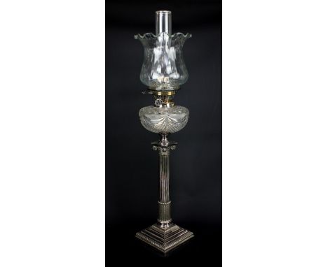 A silver plated Corinthian column oil lamp on stepped square base with foliate detail and inscribed 'With best wishes &amp; r