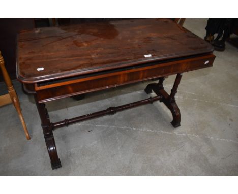 A 19th Century console or side table mahogany framed with turned base, drawer stamped Gillow Lancaster, wear and tear, marks 