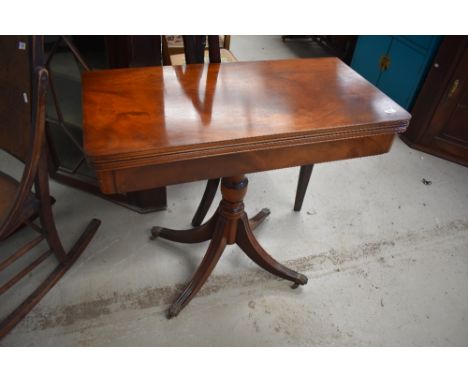 A nice quality reproduction Regency style fold over card table, width approx. 85cm