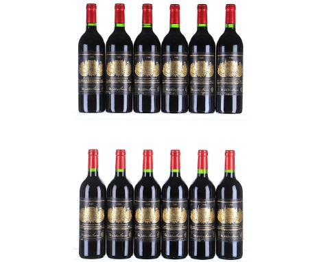 1995 Chateau Palmer 3eme Cru Classe, Margaux  12x75cl   Labels soiled, worn and slightly scuffed along bottom edge of label b