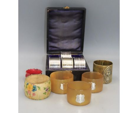 Two silver napkin rings by Henry Griffith &amp; Sons Ltd, Birmingham, 1974; silver napkin ring by Edwin Joseph &amp; Sons, si