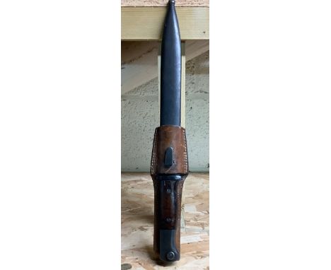 German K98 bayonet with original scabbard and leather frog. Blade L25cm. Overall L39cm