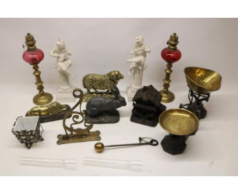 Pair of early 20th Century oil lamps, cranberry coloured reservoirs, brass columns, H54cm; Day &amp; Millward Ltd., Birmingha