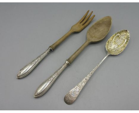 Georgian silver berry spoon with highly decorative foliate and scrolling repousse and engraving, makers mark unclear, London 