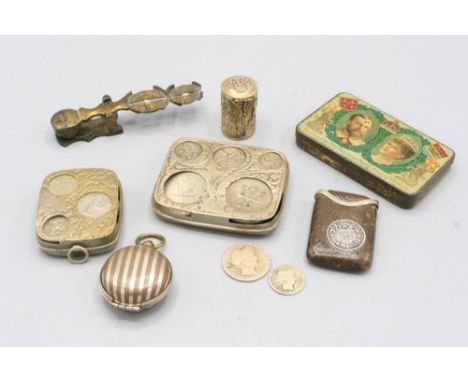 Sovereign scale, marked 1842; two coin dispensers both with embossed leaf design, a leather vesta case with an 1888 six pence