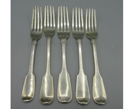 Five silver forks in fiddle pattern with 'C' monogram, three with William IV hallmarks and two with early Victorian marks, al