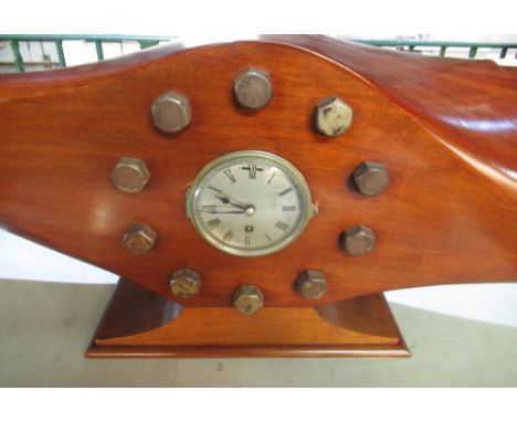 Mantle clock formed from the centre section of a wooden propeller from a Jupiter Series VI bomber stamped DRGNOWAW24738/6 W75