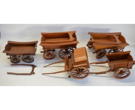 Collection of attractive large scale wooden cart models with metal rimmed wheels, largest examples approx 65cm