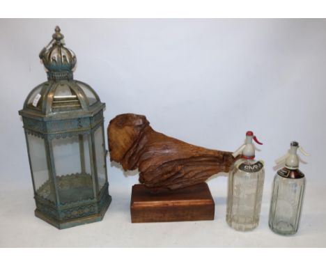 Metal garden storm lantern, H63cm; driftwood sculpture on wooden plinth, H37cm, and two vintage soda siphons (4)