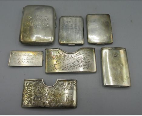 George V silver monogrammed cigarette case by Henry Clifford David, Birmingham 1919, two other silver cigarette cases, two de