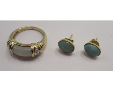 14ct yellow gold ring set with carved jade and diamond, and a pair of 14ct yellow gold opal stud earrings, all stamped 14k, 6