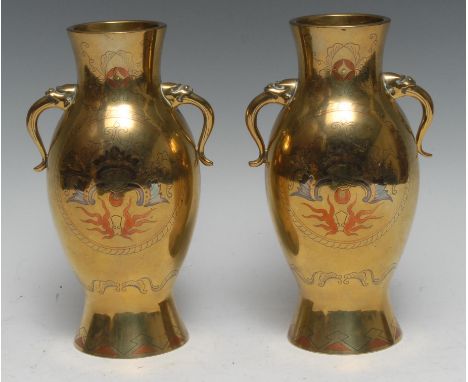 A pair of Chinese bronze ovoid vases, inlaid in silver and mixed metals with taotie, scrolls and flames, Archaic mask and scr