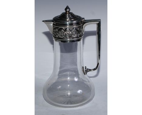 A Victorian silver mounted trumpet shaped claret jug, hinged cover with knop finial, above a deep frieze chased with flowers 