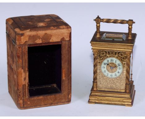 A early 20th century French gilt bronze repeater carriage clock, the 5cm circular ivorine chapter ring against an engraved sc