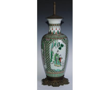 A Chinese porcelain ovoid famille vert table lamp, decorated with figures and geese in shaped reserves, against a quatrefoil 