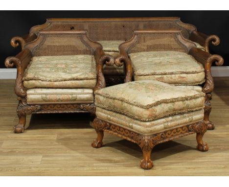 A George II Revival walnut four-piece bergère drawing room suite, in the Irish taste and the manner of Robert Strahan &amp; C