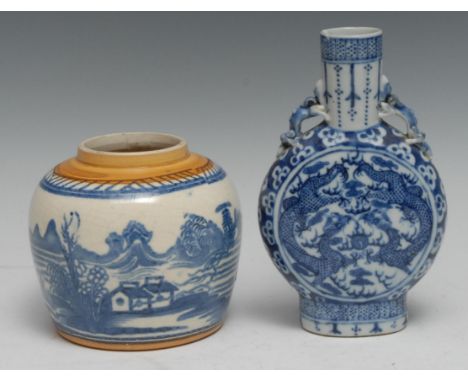 A Chinese moon flask, painted in tones of underglaze blue with dragons chasing a flaming pearl, the shoulder with prunus, 17c