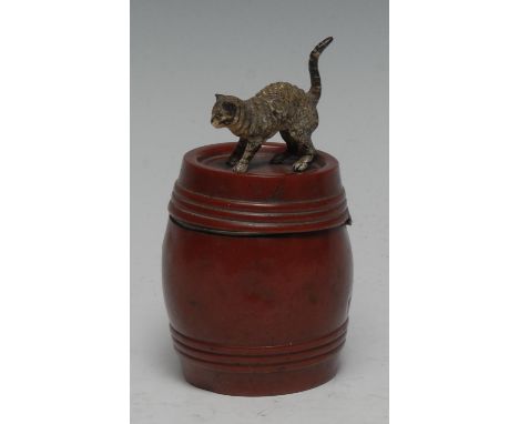 An Austrian cold-painted novelty inkwell, as a cat atop a barrel, hinged cover, 9.5cm high, early 20th century 