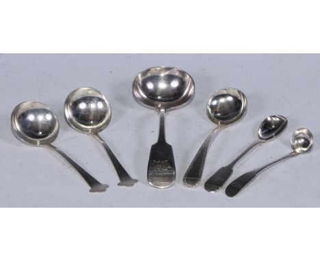 A George III silver Old English and bright-cut sauce ladle, London 1791;  a Fiddle pattern sauce ladle, London 1830;  a pair 