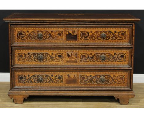 A German marquetry chest, oversailing rectangular top above three long drawers, lion mask ring handles, inlaid with animals, 