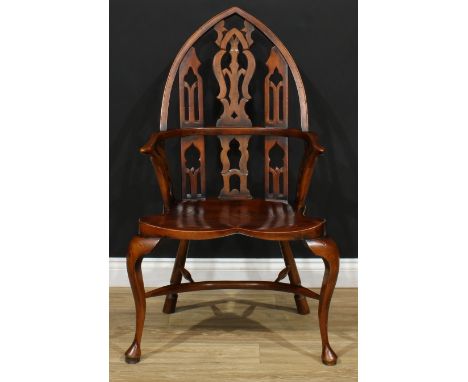 A George II style 'Gothick' Windsor elbow chair, pointed arch back, shaped splats pierced with Gothic tracery, bowed mid-rail