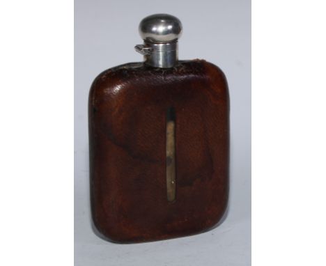 A large George V silver mounted leather-clad rounded rectangular hip flask, hinged domed bayonet-fitting cover, 17cm long, Wi