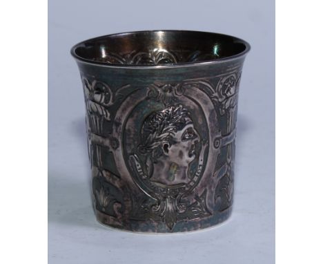 A French Empire period beaker, chased with portrait busts of Roman emperors, within C-scroll strapwork cartouches divided by 
