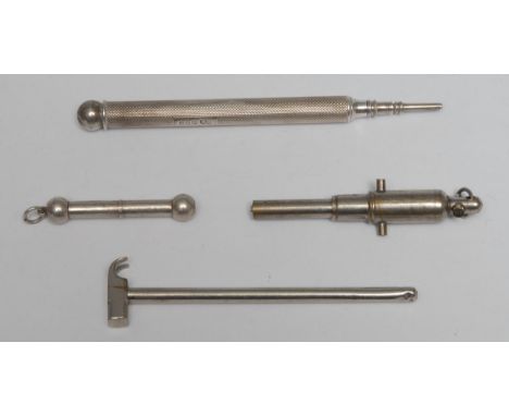 An early 20th century novelty propelling pencil, as a cannon, 7cm long; another, as a hammer; another, engine turned, Chester