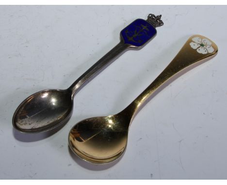 Georg Jensen - a Danish silver-gilt and enamel spoon, 14.5cm long, import marks for London 1970; another, A Michelsen, Copenh