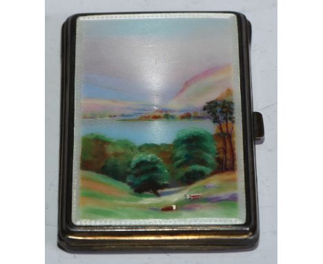 An early 20th century silver and enamel rounded rectangular cigarette case, the hinged cover decorated with Highland cattle a