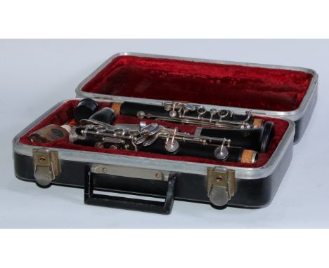 A Boosey &amp; Hawkes Symphony B-Flat clarinet, no.1010, cased; various Grade 8 sheet music (qty) 