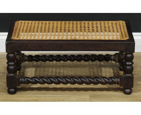 A 19th century Anglo-Indian hardwood rectangular stool, cane top, turned legs, spirally turned stretchers, bun feet, 28cm hig