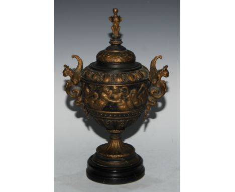 A 19th century parcel-gilt spelter urn and cover, cast in the Renaissance manner, sphinx finial, ebonised base, 40cm high, c.