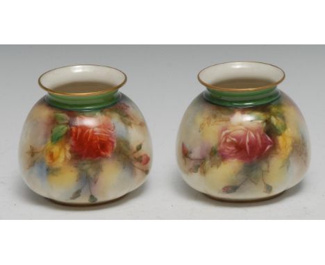 A pair of Hadley Worcester lobed ovoid vases, decorated with red and yellow cabbage roses, 8cm high, banner marks 