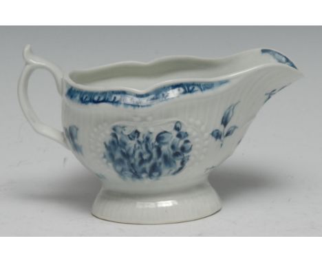 A Worcester Fisherman and Billboard Island  sauceboat,  strap moulded, cell border, 14cm wide, c.1770 (handle sprung at base 
