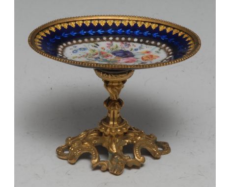 A 19th century French gilt-metal mounted Limoges enamel miniature cabinet comport, painted with colourful country flowers wit