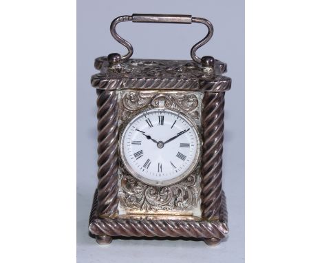 A Victorian silver miniature carriage timepiece, 3cm circular enamel clock dial inscribed with Roman numerals, French movemen